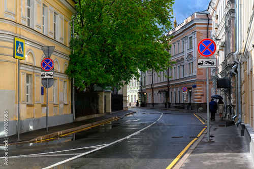 Old narrow street in center of Moscow in Russia. Cozy cityscape of Moscow. Architecture and landmarks of Moscow.