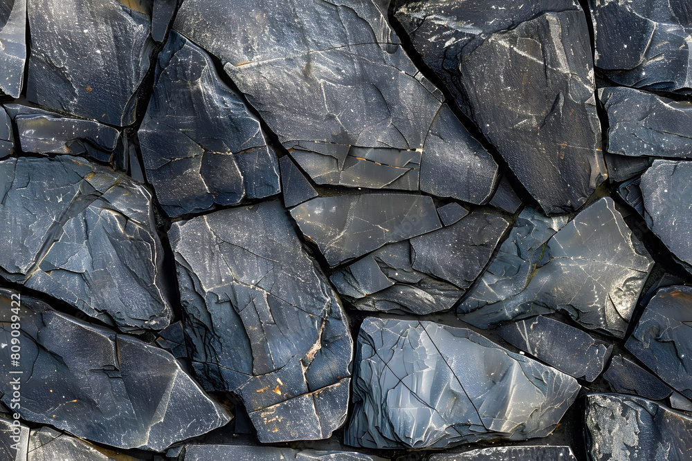 seamless Background texture of black stone wall. Close-up photo of stone wall. seamless Background texture of black stone wall. Close-up photo of stone wall.