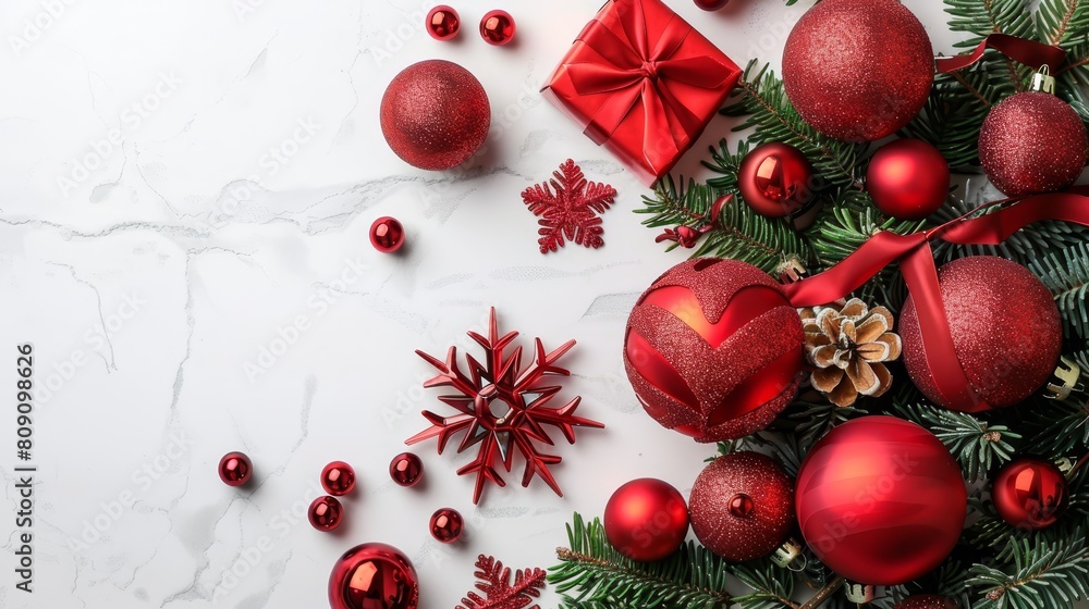 A white marble table is adorned with red Christmas ornaments One red ornament rests next to a red bow, another red ornament nearby A white marble table is adorned with red Christmas ornaments One red ornament rests next to a red bow, another red ornament nearby