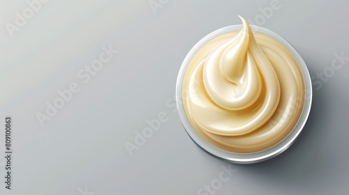  Close-up of a bowl of cream against a gray backdrop, with a droplet cascading from its surface