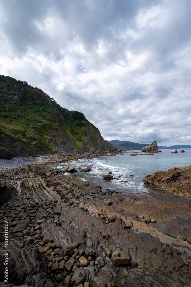 The path of the water between the rocks to the sea The path of the water between the rocks to the sea