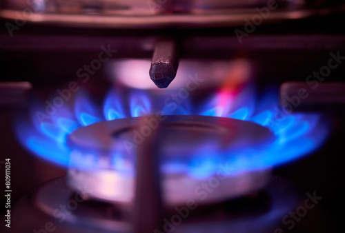 gas stove fire burns in the kitchen