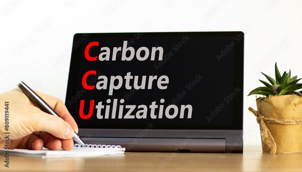 CCU Carbon capture utilization symbol. Concept words CCU Carbon capture utilization on beautiful tablet. Beautiful white background. Business ecological Carbon capture utilization concept. Copy space.