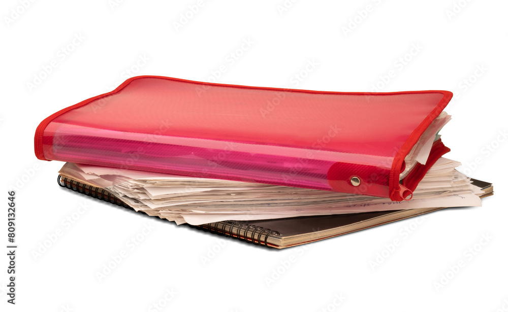 Stack of red plastic folder, different papers and spiral bound brochure isolated on a transparent background Stack of red plastic folder, different papers and spiral bound brochure isolated on a transparent background