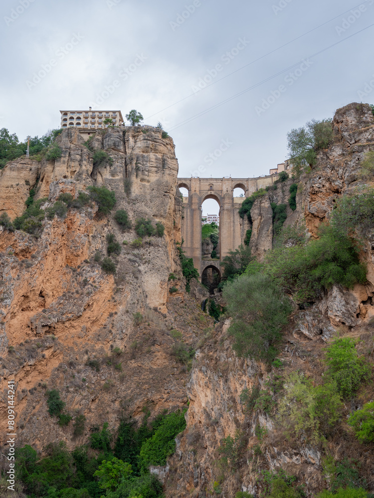 Fototapeta premium Scenic views Puente Nuevo bridge from Mirador La Hoya Del Tajo lookout in Ronda in the Andalusia region of southern Spain