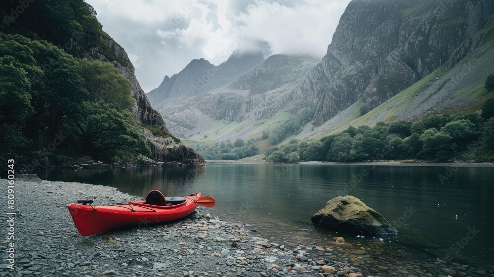 a red kayak resting on its shore, framed by cloudy skies, while the serene waters mirror the majestic mountains and verdant greenery. a red kayak resting on its shore, framed by cloudy skies, while the serene waters mirror the majestic mountains and verdant greenery.