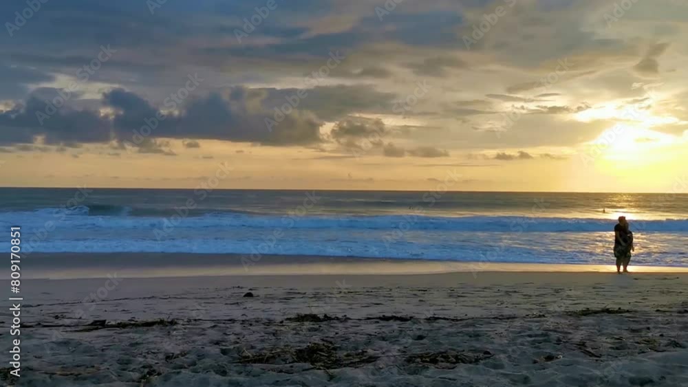 Colorful golden sunset people wave and beach Puerto Escondido Mexico. Colorful golden sunset people wave and beach Puerto Escondido Mexico.