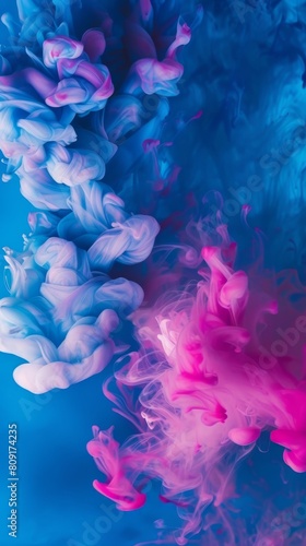 Blue and pink smoke swirls on dark background