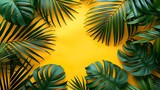 ressoapk Flat lay of green palm branches over yellow backgroun