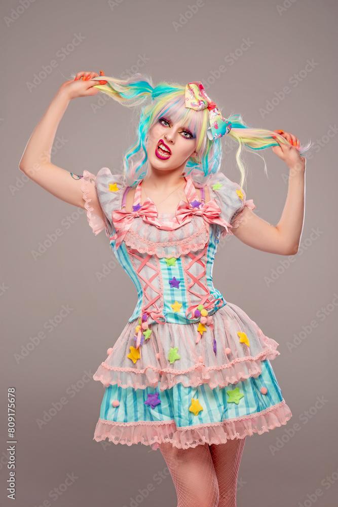 Pretty female clown model in colorful outfit and hair Pretty female clown model in colorful outfit and hair