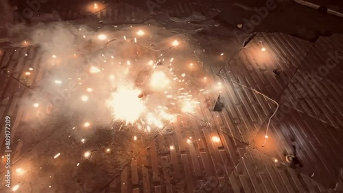 Slow motion of a rolling cracker was sparkling after flamed photo