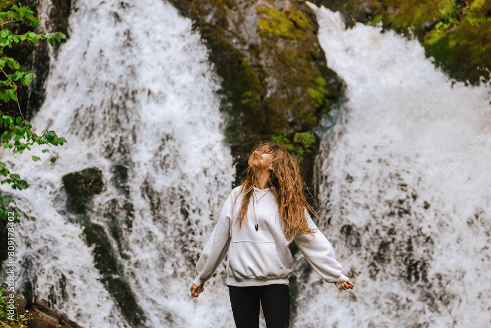 Woman Traveler Enjoying Mountain Waterfall Landscape Woman Traveler Enjoying Mountain Waterfall Landscape