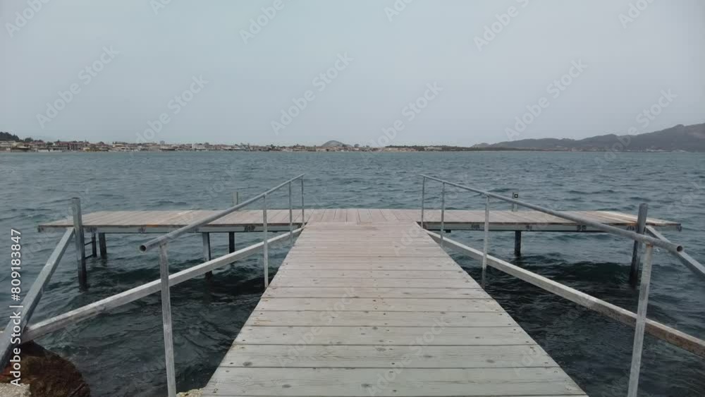 Agios Sostis harbour in Zakynthos , wooden pontoon Agios Sostis harbour in Zakynthos , wooden pontoon