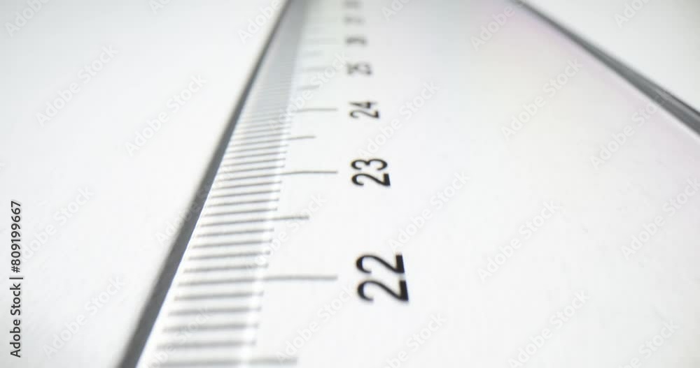 Durable metal rule with clear digits on neutral background