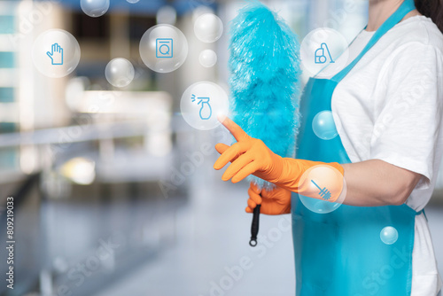 Cleaning lady clicks a spray icon.
