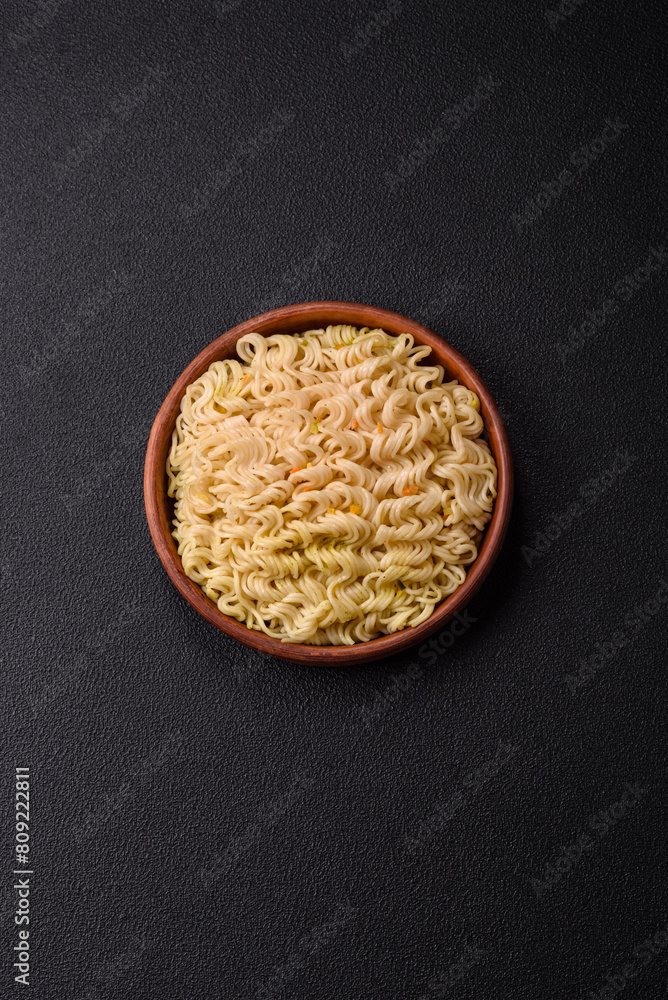 Delicious Asian dish rice noodles or udon with vegetables, spices and herbs Delicious Asian dish rice noodles or udon with vegetables, spices and herbs