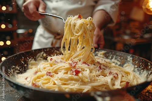 Chef serving spaghetti carbonara with parmesan in a rustic kitchen setting. Close-up action shot with dynamic lighting. Italian cuisine and cooking experience concept. Design for menu and culinary 