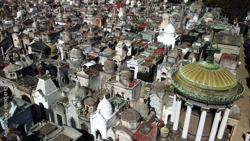 Top down aerial view of historic cemetery in Buenos Aires, Argentina. Ancient urban graveyard with old chapel, tombstones, crosses, monuments. Religious architecture, Christian symbol.