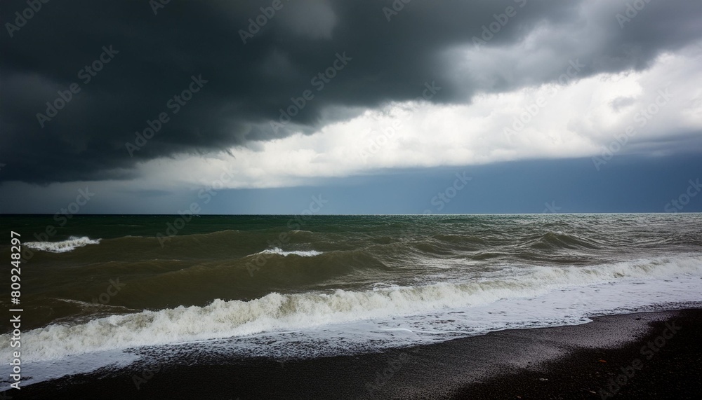 dark stormy sea with dark dramatic cloud in the sky