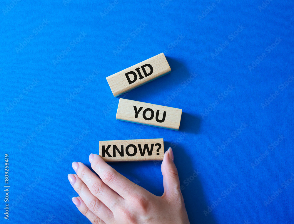 Did you know symbol. Wooden blocks with words Did you know. Businessman hand. Beautiful blue background. Business and Did you know concept. Copy space. Did you know symbol. Wooden blocks with words Did you know. Businessman hand. Beautiful blue background. Business and Did you know concept. Copy space.
