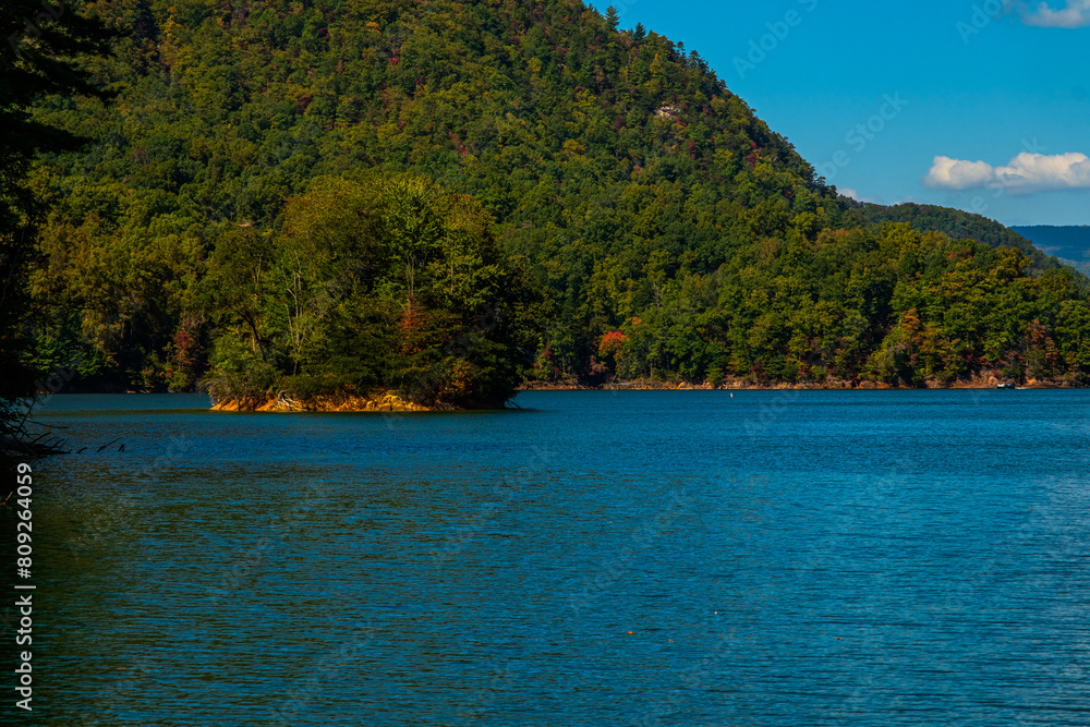 Serene vista of a small island contained in inlet on Watauga Lake in Tennessee