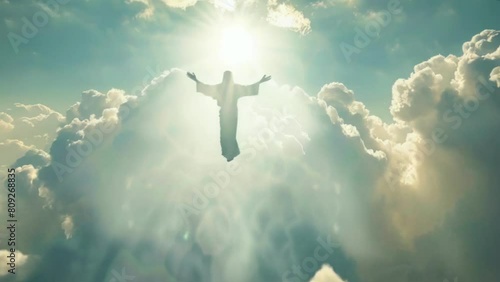 God Jesus Christ rising up into the bright light of heaven clouds. photo