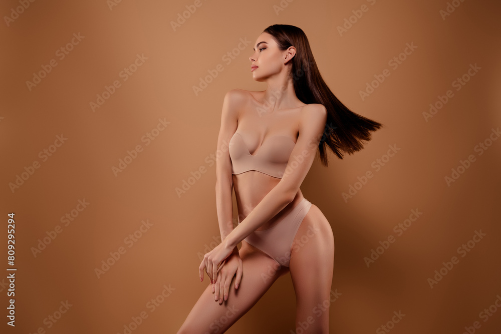Photo of attractive girl feel graceful posing look empty space isolated pastel color background Photo of attractive girl feel graceful posing look empty space isolated pastel color background