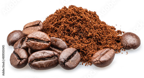 Heap of ground or crushed coffee beans and whole roasted coffee beans isolated on white background.