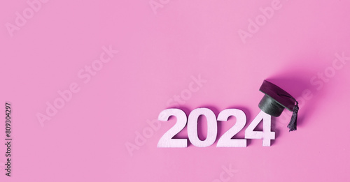 2024 number with graduated cap. Graduation holiday concept. Class of 2024