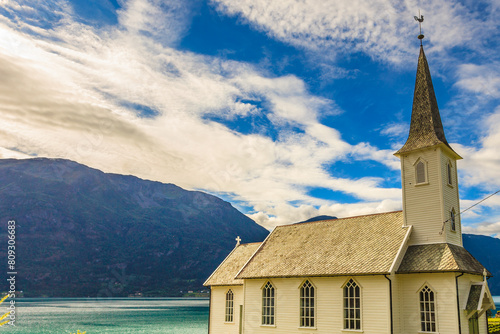 Wooden church in Nes village, Norway photo