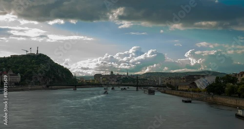 Budapest, Hungary - April 20, 2024: Cityscape view from Petofi bridge. Time-lapse. photo