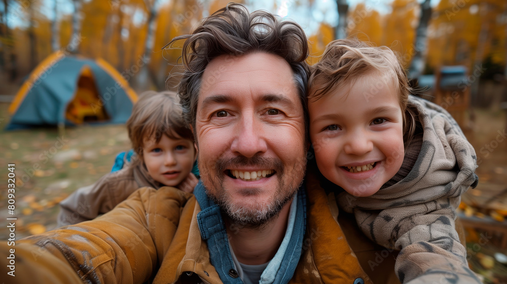 Joyful Middle-aged Father Bonding with his Children Captures Heartfelt Family Moment in Backyard Selfie Session Joyful Middle-aged Father Bonding with his Children Captures Heartfelt Family Moment in Backyard Selfie Session