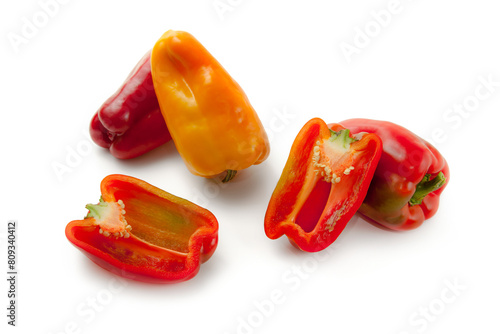 Whole and halves of bell pepper isolated on white background with clipping path. .