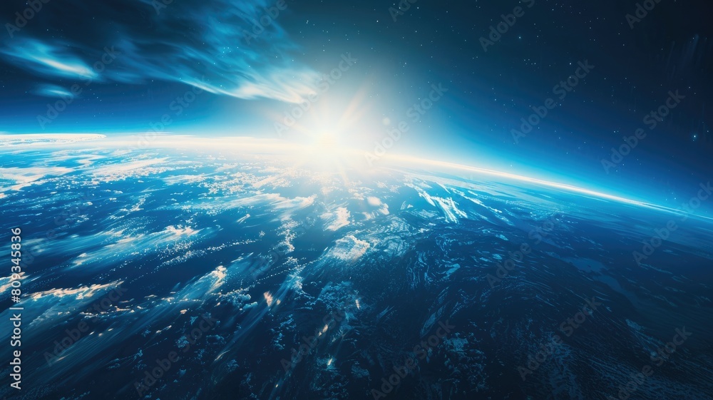 Sunrise cresting over Earth, viewed from space with atmospheric glow and starry sky Sunrise cresting over Earth, viewed from space with atmospheric glow and starry sky
