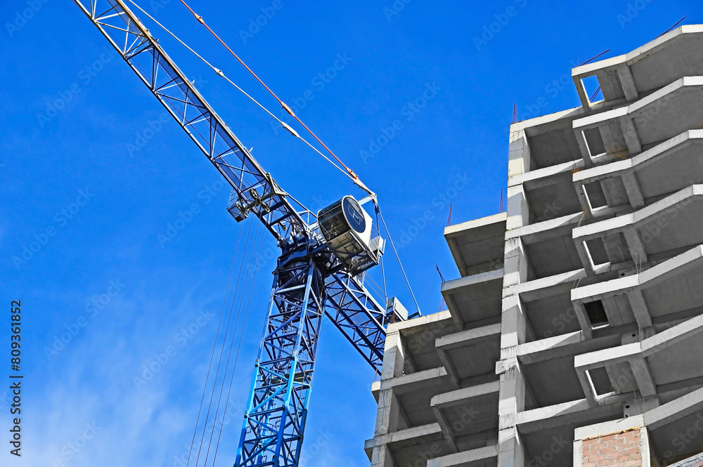 Naklejka premium Construction site with crane and sky