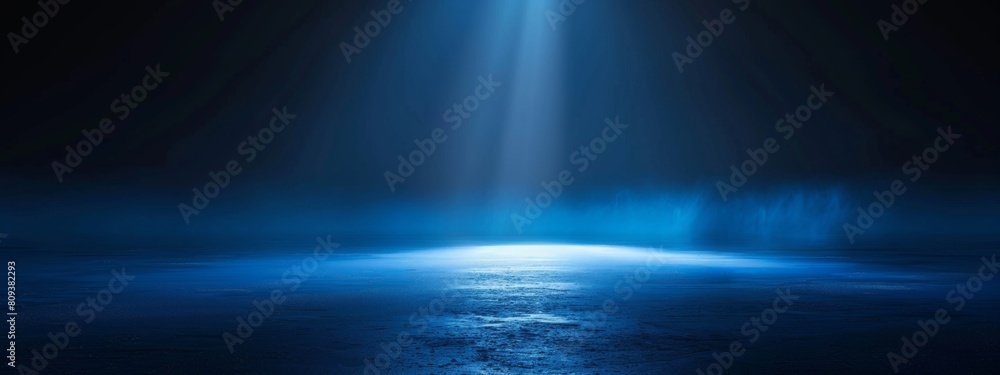 Dark blue background with light rays, glowing and shining on the floor, creating an atmospheric effect.