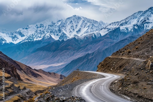 Endless mountain roads winding through rugged peaks and vast valleys.