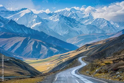 Endless mountain roads winding through rugged peaks and vast valleys.