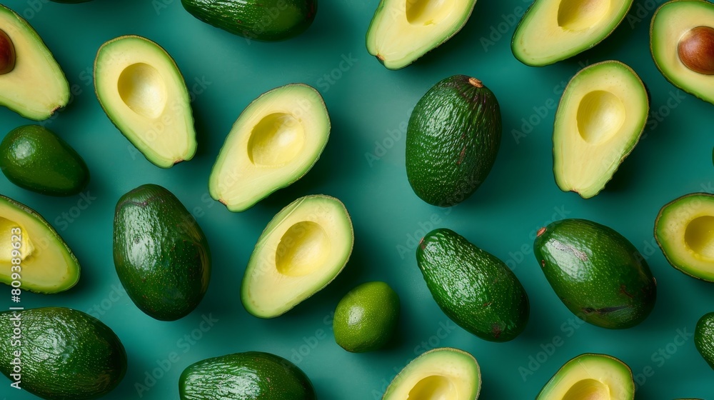 Artistic close-up of whole and sliced avocados creating a unique pattern on a soothing pastel yellow background, isolated with studio lights Artistic close-up of whole and sliced avocados creating a unique pattern on a soothing pastel yellow background, isolated with studio lights