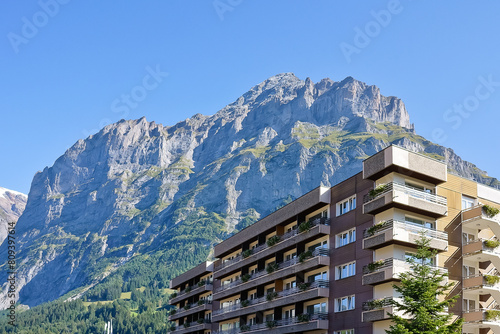Wallpaper Mural Apartments building with the background of Mittelhorn mountain Grindelwald Switzerland Torontodigital.ca