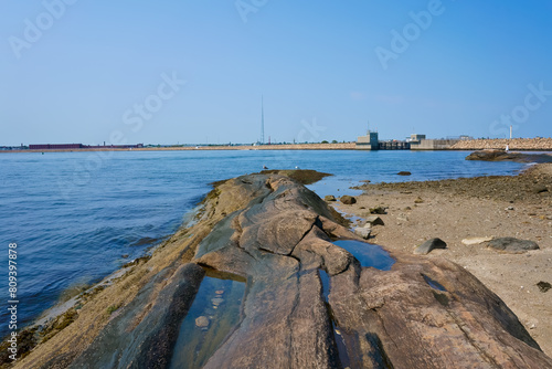 Rocky beach of Fort Pheonix State Reservation MA USA photo