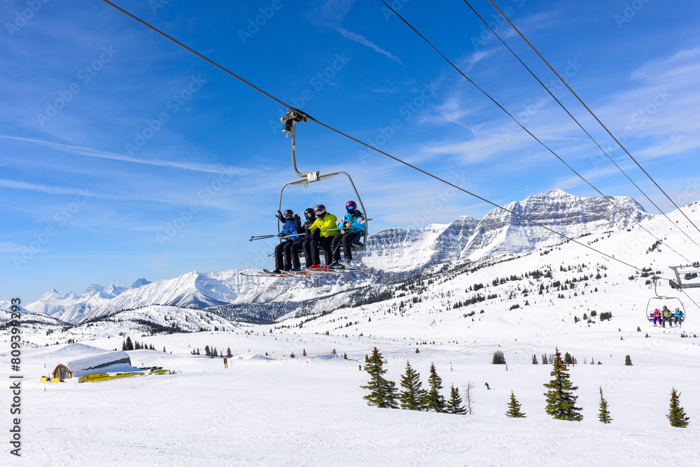 Skiers on the chairlift at Sunshine Village Ski Resort in Banff National Park. Skiers on the chairlift at Sunshine Village Ski Resort in Banff National Park.
