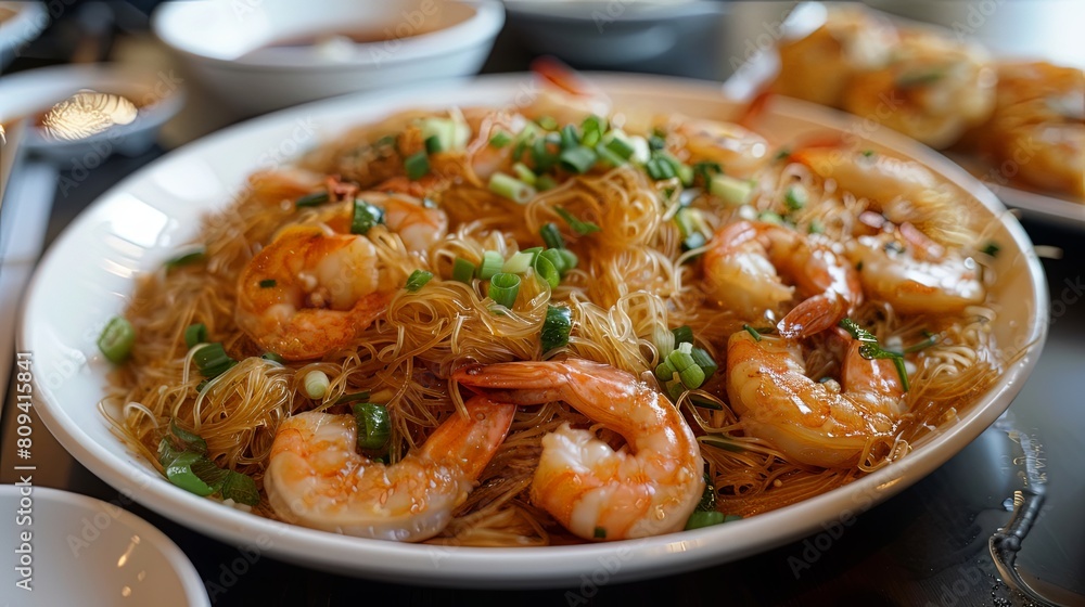 Tasty Seafood Fare: Irresistible shrimp and wok-tossed vermicelli, a satisfying dish bursting with flavor. Tasty Seafood Fare: Irresistible shrimp and wok-tossed vermicelli, a satisfying dish bursting with flavor.