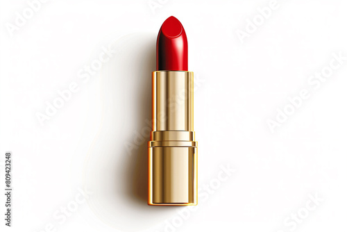 a red lipstick with a gold rim on a white surface