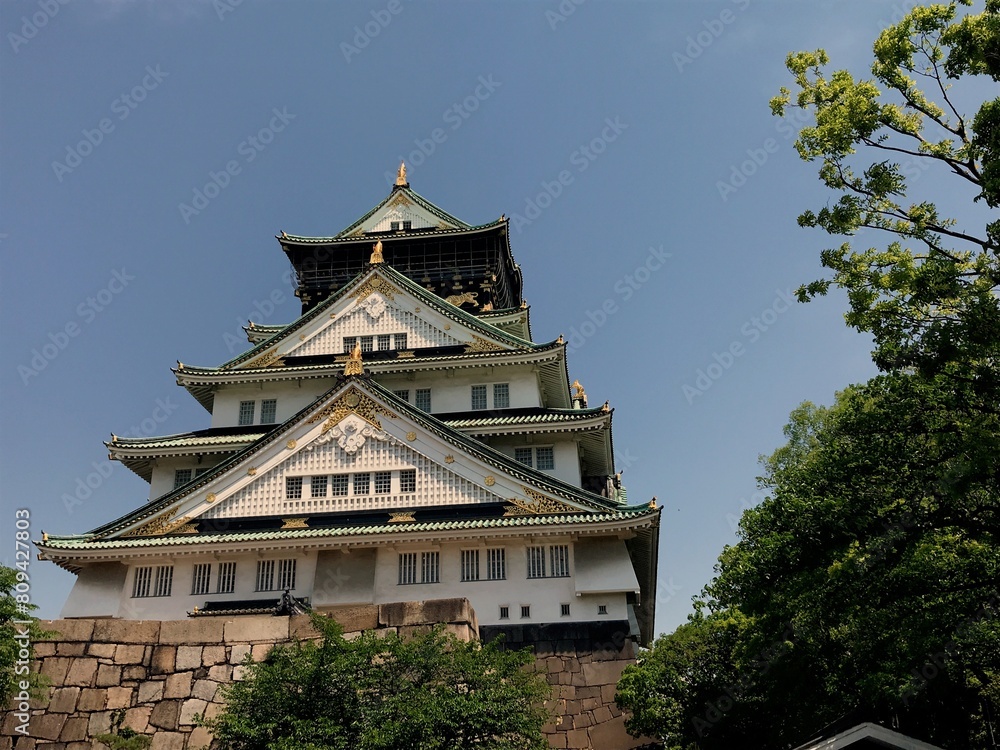 Osaka Castle in Japan with clear blue sky Osaka Castle in Japan with clear blue sky