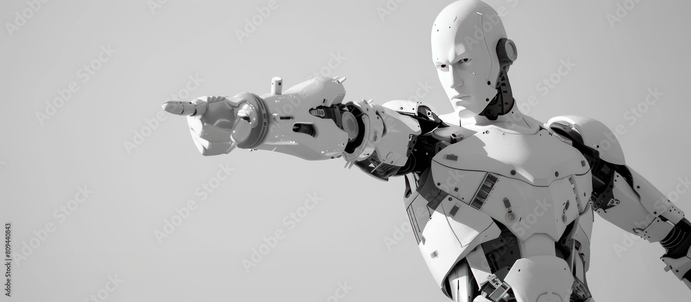 A white robot is pointing with its finger on a white background. A white robot is pointing with its finger on a white background.