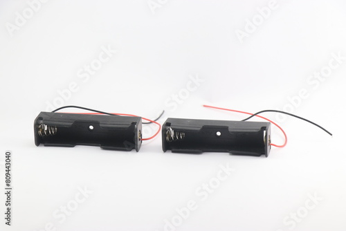 Single cell lithium ion battery holders on a white background