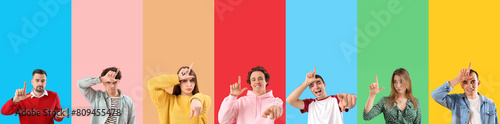 Group of young people showing loser gesture on color background