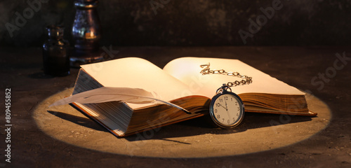 Open old book with clock, f...