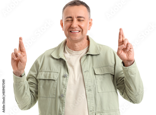 Mature man crossing fingers...